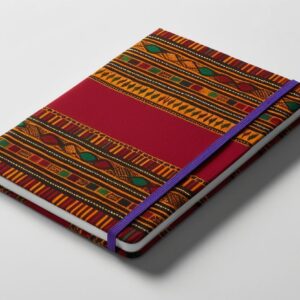 Stylish notebook with African-inspired fabric cover, closed and centered on white background, sharp edges, no shadows